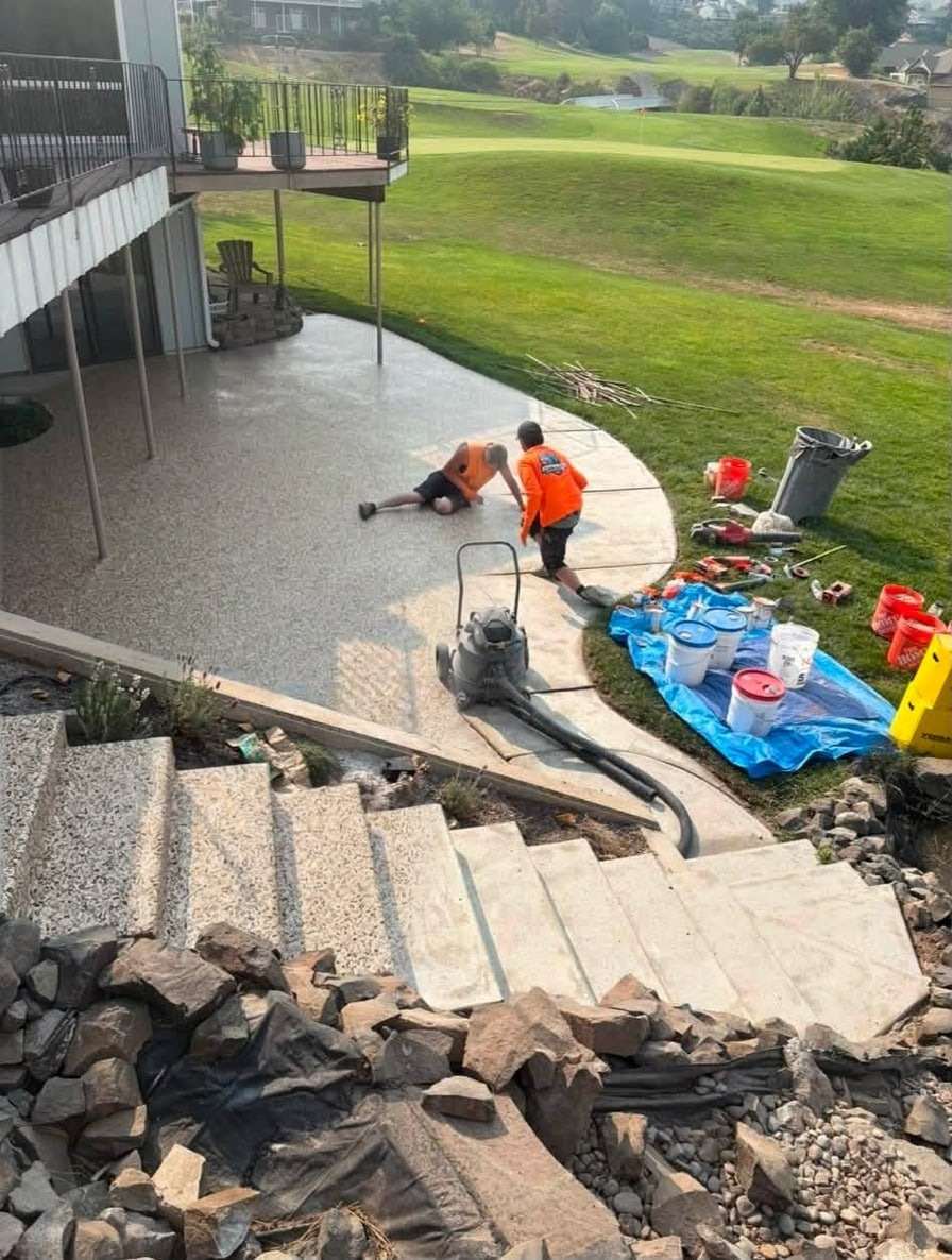 A contractor's patio job photo, half bare concrete and half Shoreline flake coating, previewed by the Floor Visualizer